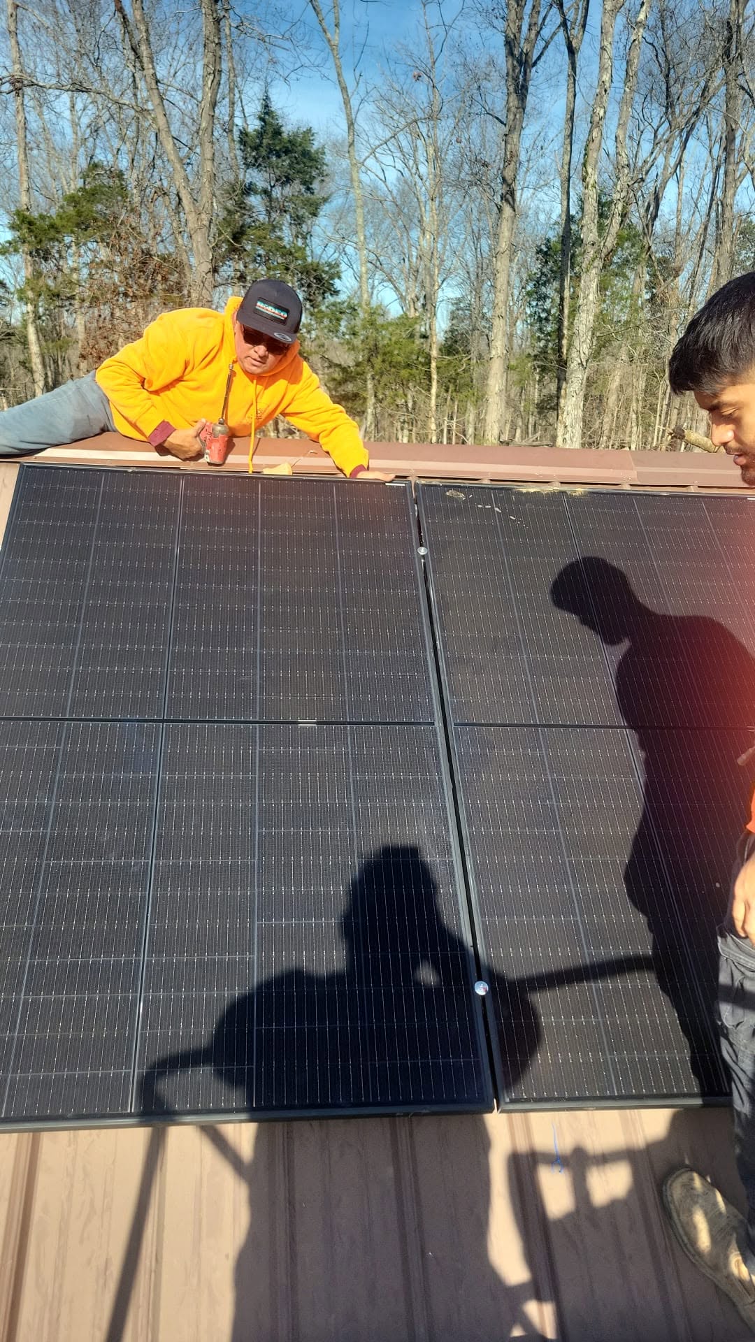 Solis Electric team members working on an electrical project